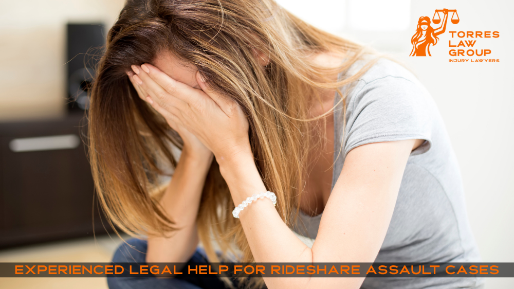 Distressed woman sitting with head in hands, representing emotional impact of Uber and Lyft sexual assault cases in Oakland and the SF Bay Area; Torres Law Group offers bilingual legal support.